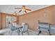 Patio area with outdoor furniture, grill, and ample space for relaxation and entertainment at 2330 Peterson Rd, Lakeland, FL 33812