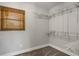 Walk-in closet with shelving and a window for natural light at 2465 Thornhill Rd, Auburndale, FL 33823