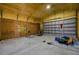 Spacious garage with painted ceiling and walls at 2465 Thornhill Rd, Auburndale, FL 33823