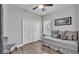 Comfortable bedroom with a daybed, closet, and a view of a window with blinds at 2726 Greyhawk Estates Ln, Lakeland, FL 33812