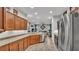 Modern kitchen boasts granite countertops, stainless steel appliances, and ample cabinet space at 2726 Greyhawk Estates Ln, Lakeland, FL 33812