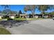 Well-manicured single story home features mature landscaping, nice lawn and attractive curb appeal at 29 Buck Cir, Haines City, FL 33844