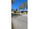Street view of a one-story home with a mature tree at 29 Buck Cir, Haines City, FL 33844