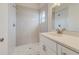 Updated bathroom featuring subway tile walls, a stone countertop, and a walk-in shower at 3815 Horizon View Loop, Lakeland, FL 33813