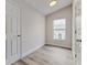 Bright bedroom featuring vinyl floors, and neutral paint at 3815 Horizon View Loop, Lakeland, FL 33813