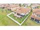 An aerial view of a backyard with a screened in lanai and a white fence at 3965 Aquilla Dr, Lakeland, FL 33810