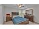 Cozy bedroom with comfortable furniture, closet, ceiling fan, and natural light at 3965 Aquilla Dr, Lakeland, FL 33810