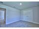 Bedroom featuring plush carpet, neutral walls, and a double door closet at 4058 Tullamore Ln, Auburndale, FL 33823