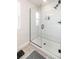 Stylish bathroom featuring a glass shower, modern tile, and bright natural light at 4525 Breccia Ln, Lakeland, FL 33811