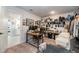 Functional office space with closet, a built-in shelving system, and a desk setup for efficient work at 4525 Breccia Ln, Lakeland, FL 33811