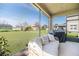 Relaxing screened patio area, perfect for enjoying the outdoors with views of the backyard at 4525 Breccia Ln, Lakeland, FL 33811