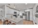 Bright kitchen featuring stainless steel appliances, a breakfast bar, and pendant lighting at 4620 S Gary Ave, Lakeland, FL 33813