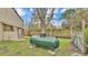 The backyard includes a large propane tank, set within a fenced yard at 5062 1St Nw St, Lakeland, FL 33810