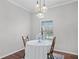 Charming dining area with elegant lighting and seating at 507 Eagle Pond Dr # 507, Winter Haven, FL 33884