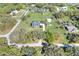 Aerial shot showcases the neighborhood homes on large lots with mature trees and green spaces at 5118 Eagles Nest Dr, Lakeland, FL 33810