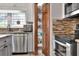 Close up shot of a kitchen with stainless steel appliances, and granite countertops at 5118 Eagles Nest Dr, Lakeland, FL 33810