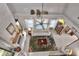 Top-down view of cozy living room featuring a fireplace, white sofa, and unique decor at 5118 Eagles Nest Dr, Lakeland, FL 33810