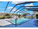 Inviting screened-in pool with clear water, surrounding trees, and ample space for relaxation and entertainment at 5118 Eagles Nest Dr, Lakeland, FL 33810