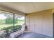 View of the screened patio, including outdoor furniture, with a view of the beautiful backyard at 5225 Imperial Lakes Blvd # 49, Mulberry, FL 33860