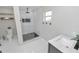 This is a bathroom with a walk-in shower and a modern vanity at 5252 Montserrat Dr, Lakeland, FL 33812