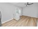 Light-filled dining room with wood-look floors, a ceiling fan, and access to the backyard at 5252 Montserrat Dr, Lakeland, FL 33812