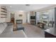 Bright living room with large window, modern furniture, and vintage sewing machine at 531 Gibson S Rd, Lakeland, FL 33813