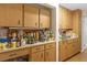 Well-organized pantry with ample storage space and solid wood cabinetry at 531 Gibson S Rd, Lakeland, FL 33813