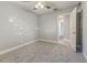 Bedroom with neutral colored walls and carpet at 5420 Ivory Ln, Lakeland, FL 33811