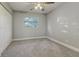 Bedroom with closet and neutral carpeting at 5420 Ivory Ln, Lakeland, FL 33811