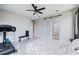 Spacious main bedroom with modern sliding door leading to bright en-suite bathroom at 5431 Arlington River Dr, Lakeland, FL 33811