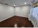 Bright bedroom with hardwood floors and built in shelving at 561 Lake Mystic Ln, Lakeland, FL 33813