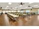 Spacious banquet hall with tables and chairs for large gatherings at 5725 Mallard Dr, Lakeland, FL 33809