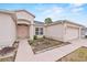 Charming home exterior featuring a well-manicured front yard and inviting entrance with double doors at 5725 Mallard Dr, Lakeland, FL 33809