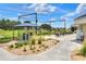 Relax at the putting green under a gazebo with chairs, set amongst a landscape of river rock and ornamental grasses at 5725 Mallard Dr, Lakeland, FL 33809