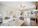 Bright living room featuring hardwood floors, modern decor, and a partial view of a stone fireplace at 624 Woodward St, Lakeland, FL 33803