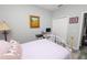 Bright bedroom with a brass bed frame, decorative art and a work desk at 6329 Torrington Cir, Lakeland, FL 33811