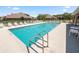 A resort-style community pool provides relaxation with its clear waters, comfortable seating, and inviting atmosphere at 6329 Torrington Cir, Lakeland, FL 33811