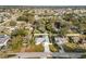 Aerial view of property highlighting the layout, landscaping, and surrounding neighborhood at 7211 Scenic Hills Blvd, Lakeland, FL 33810