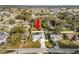 Aerial view of property highlighting the layout, landscaping, and surrounding neighborhood at 7211 Scenic Hills Blvd, Lakeland, FL 33810