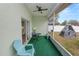 Screened-in patio featuring outdoor seating and a view of the backyard play area at 7211 Scenic Hills Blvd, Lakeland, FL 33810