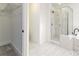 Elegant bathroom showcasing a walk-in closet and luxurious walk-in shower at 750 W Vine St, Bartow, FL 33830