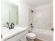 Stylish bathroom featuring modern fixtures and a white marbled tiled shower and bathtub combo at 750 W Vine St, Bartow, FL 33830