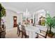 Elegant dining room features a chandelier and classic decor at 940 Ashton Oaks Cir, Lakeland, FL 33813