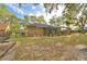 Large backyard featuring an enclosed pool area, perfect for relaxation and enjoying the outdoors in privacy at 1 Lake Eloise Ln, Winter Haven, FL 33884