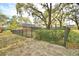 Expansive backyard is enclosed by a secure, wrought iron fence at 1 Lake Eloise Ln, Winter Haven, FL 33884