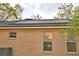 View of home exterior with solar panels installed on the roof at 1 Lake Eloise Ln, Winter Haven, FL 33884