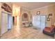 Cozy living room featuring tile floors, neutral walls, and comfortable seating at 1 Lake Eloise Ln, Winter Haven, FL 33884