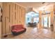 Elegant living room with decorative wall details leading into the dining area at 1 Lake Eloise Ln, Winter Haven, FL 33884