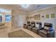 Relaxing living room with comfy seating and access to the outdoor patio area at 1 Lake Eloise Ln, Winter Haven, FL 33884