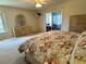 Spacious bedroom with a dresser and closet at 1155 Motorcoach Dr, Polk City, FL 33868